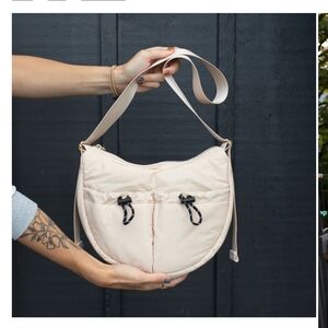 Rad Rev Cream Moon Purse